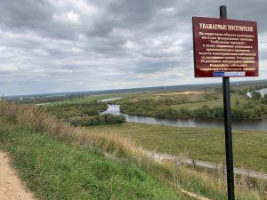 river and sign